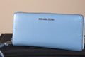 Michael Kors Large Pebbled Leather Continental Wallet Blue One Size